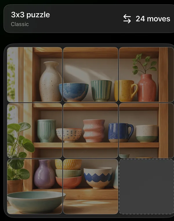 The finished board at 24 moves: the Pottery Shelf picture complete except for the bottom-right corner, which stays empty